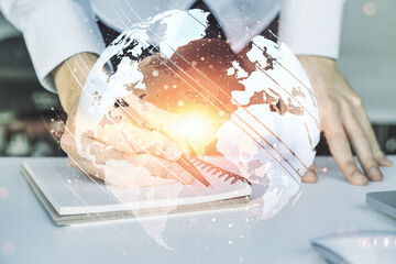 Poster - Multi exposure of abstract graphic world map and hand writing in notepad on background with laptop, connection and communication concept