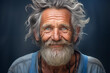 Portrait of an old smiling man looking into the lens