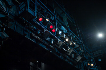 Wall Mural - many theater spotlights above the stage