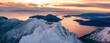 Snow Covered Mountains on Pacific Ocean Coast. Aerial Canadian Winter Landscape