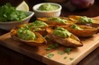 Delicious oven-baked potato wedges topped with flavorful guacamole. Generative AI