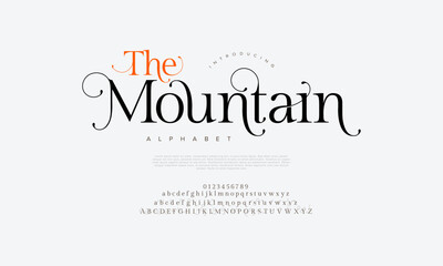 Themountain premium luxury elegant alphabet letters and numbers. Elegant wedding typography classic serif font decorative vintage retro. Creative vector illustration