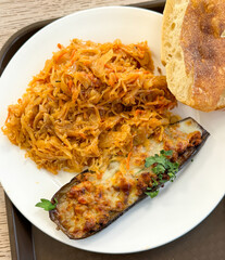 Sticker - Fried eggplant with stewed cabbage in a plate