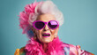 © Natalia Klenova - Happy senior woman in colorful  outfit, cool sunglasses, laughing and having fun in fashion studio