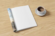 Magazine right-hand page mockup and cup of coffee on wooden desk