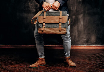 Wall Mural - hipster man with stylish shoulder bag. lifestyle, fashion, style and people concept