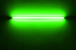 Green neon lamp on a white wall for design