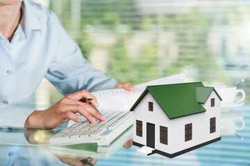 Poster - Real estate agent model house  on the desk