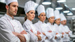 © Kondor83 - Team of professional chefs in commercial kitchen