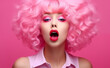 © Curioso.Photography - Vibrant Expression: Pink Wig Woman with Wide Open Mouth and Bold Lips Makeup