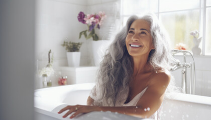 Wall Mural - happy beautiful senior woman in bathroom