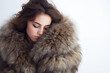 Luxury girl in a fur coat. Cold girl. Lynx, fur, fashion, beauty. Wind Fur Saloon, north.
