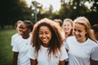 © Baba Images - Group portrait of female soccer team on football field