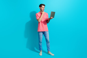 Aufkleber - Full body photo of young thoughtful guy touch chin plan business costs in excel app using netbook isolated on aquamarine color background