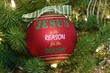 © Wirestock - Jesus is the reason for the season ornament hanging in Christmas Tree.