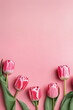 Flowers background. Tulips bunch flatlay 8 march mom s bouquet. Happy mothers day. Spring petal top view Bright floral gift Copy space Flat lay on table. Art colorful love card frame. Above fresh leaf