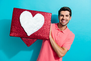 Poster - Portrait of young man popular blogger brunet hair guy holding red symbol heart collage click like isolated on aquamarine color background