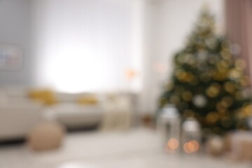 Canvas Print - Christmas tree in furnished living room, blurred view. Festive interior design