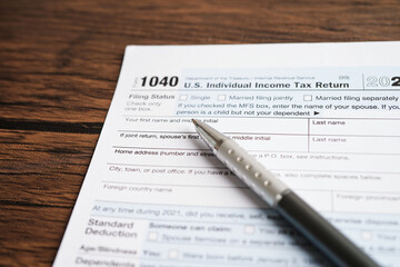 Wall Mural - Tax form 1040 U.S. Individual Income Tax Return, business finance concept.