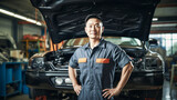 Fototapeta  - 自動車整備士の働く男性 Car repair engineer  