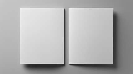 Wall Mural -  a white book opened on top of a gray surface with a shadow on the bottom of the book and a shadow on the top of the bottom of the book.