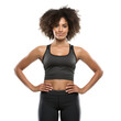portrait of an Afro-American female fitness trainer posing on transparent background