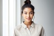 Effortless Elegance: Indian Woman Sporting a Polka Dot Blouse and Bun Hairstyle generative ai