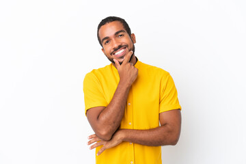 Poster - Young Ecuadorian man isolated on white background happy and smiling