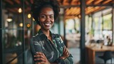 Fototapeta  - Happy human resources manager smile, leadership and vision for success. Portrait of a black business woman standing arms crossed, smiling and feeling positive while working in an startup office
