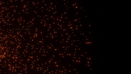 Wall Mural - Blinking and glowing red-orange particles move chaotically on a black background. looped animation. 3d render