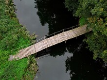 Little Wooden Bridge Over Water.