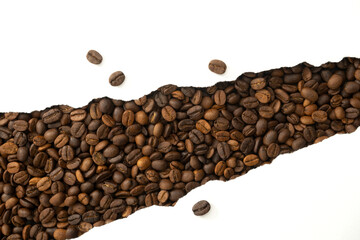 Coffee beans and ripped paper background. Copyspace for your text