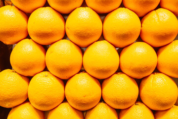 Wall Mural - fresh orange fruits as background, top view. High quality photo