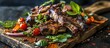 Grilled lamb ribs with mint and colorful vegetables.