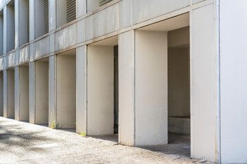 Poster - Urban architecture. Apartment  building made of columns.