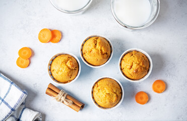 Wall Mural - Carrot muffins with drink