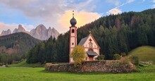 Beautiful Church of St John of Nepomuk , Dolomites, South Tyrol. Famous best alpine place of the world, Santa Maddalena (St Magdalena) village with magical Dolomites mountains in background, Val Funes