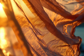 Poster - A close up view of a piece of cloth with the sun in the background. Suitable for various applications