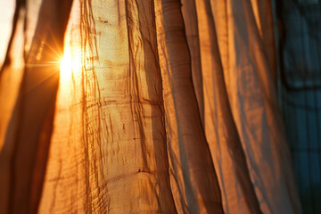 Poster - Sunlight shining through curtains in a room. Can be used to depict a bright and inviting atmosphere.