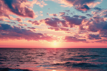 Poster - A beautiful sunset over the ocean with clouds in the sky. Ideal for travel and nature-themed projects