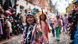groupe d'enfant qui parade dans la rue pour Mardi-gras
