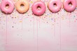 Donuts pattern with icing on white background. Sprinkled sweet and colourful glazed doughnut. Minimal food concept for design, brochure, banner, menu. Flat lay, top view with copy space
