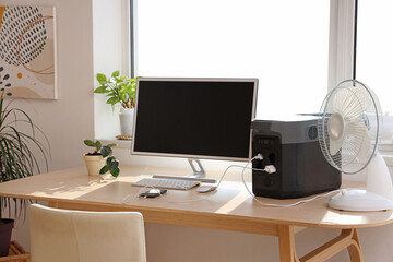 Wall Mural - Comfortable workspace with modern computer and portable power station