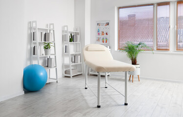 Poster - Interior of rehabilitation center with couch and shelf units