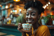 African American beautiful young woman happy smiling  drinking a cup of coffee in cafe