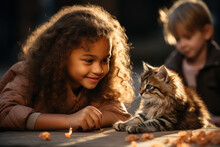 Little Happy Multinational Children Are Playing With A Cat In The Kindergarten