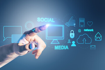 Poster - Close up of male hand pointing at creative social media interface with emails, speech bubbles, mobile internet, cloud computing and other icons on blurry blue background.