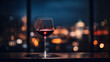 Elegant glass of red wine with a city nightscape backdrop, highlighting urban sophistication.