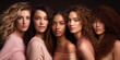 Unity concept: A diverse group of women of all skin tones, hair types posing together. A multiculture group  standing together. Neutral colour. Women's day banner.