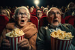 Eager Elderly Moviegoers In A Cinematic Setting, Anticipating A Film With Realistic Popcorn